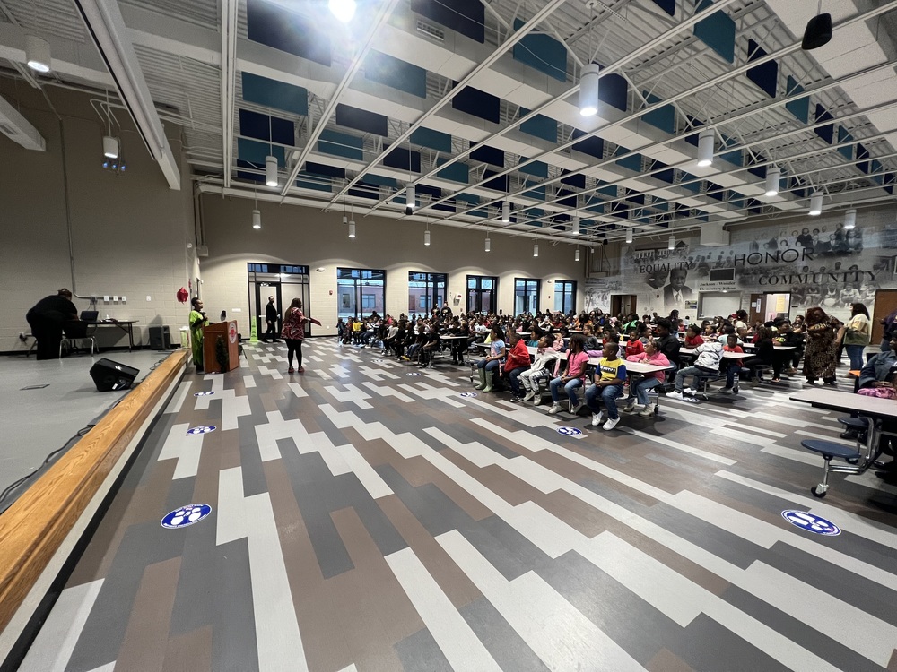 Students sitting attentively at JWES