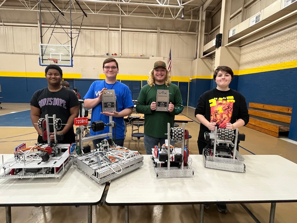 AWM robotics team members hold awards
