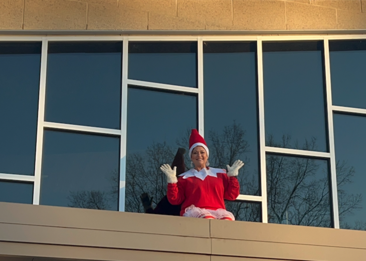Kristi Rice as the RES elf on the shelf...on the roof